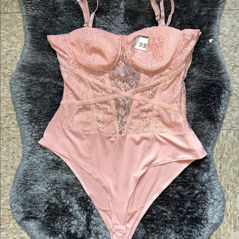 Pink body suit